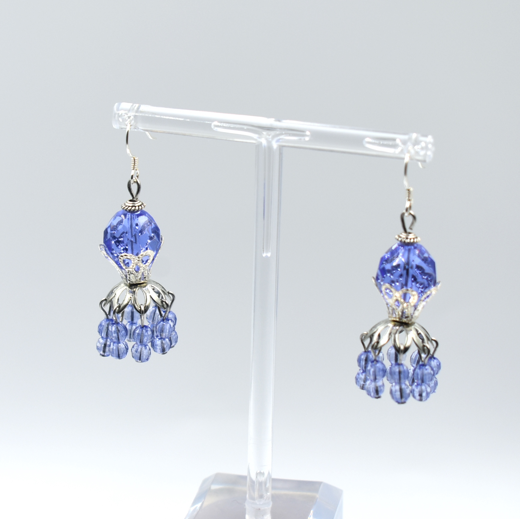 Pendientes de plata y zamak con cristal color malva